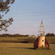 Image for article titled The haunting beauty of abandoned playground rockets